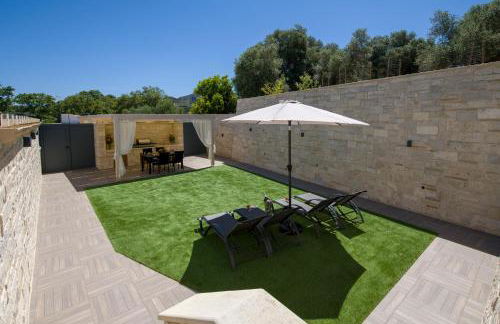 TWIN'S HOME LUXURY SUITES - Photo 32