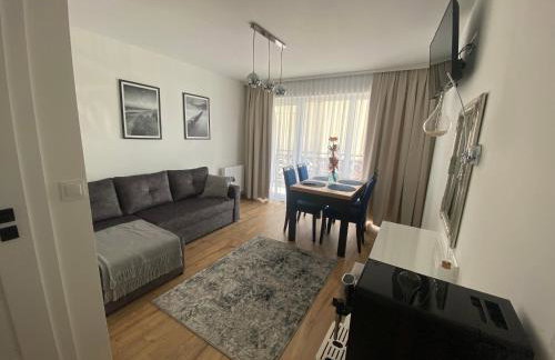 SOLEK, Apartamenty hotelowe i pokoje gościnne ze śniadaniem, przyjazne zwierzętom, wyjątkowe, z widokiem na Jezioro Jamno i w bardzo bliskiej odległości od morza - Foto 32