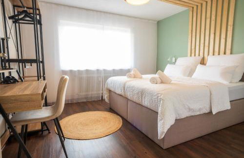 Stadtjuwel I Balkon I 6 Min zum See - Foto 8