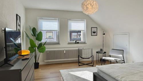 Gemütliches Dach-Apartment in der Stadt - ADAM - - Foto 2