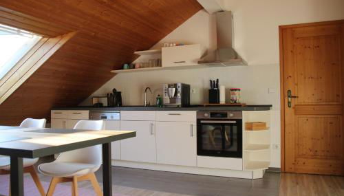 Ferienwohnung - Dachgeschoss Schmuckstück - Foto 2, stove