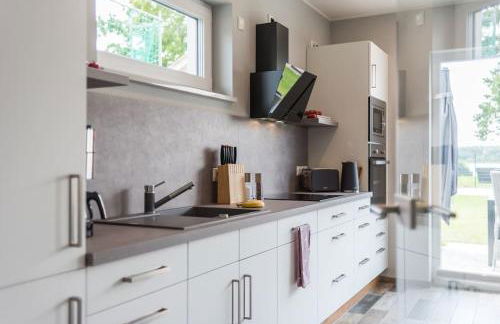 5 Sterne-Ferienhaus Eisvogel am See mit Sauna und Kamin - Foto 35