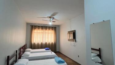 Apartamento 114 - Suíte em região central com ventilador - Foto 1