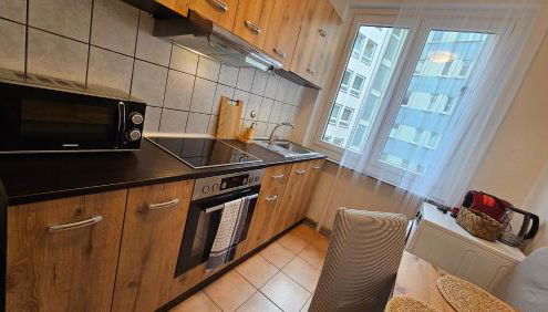 City Center Comfort - Cozy, Fully Equipped 3-Room Apartment Near Main Station - Foto 5, stove