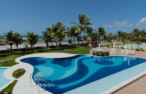 Flat Guarajuba Beira da Praia pé na areia - Foto 1