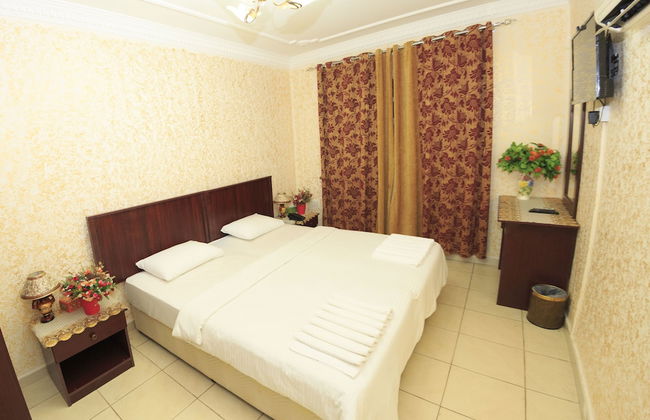 Gulf Hotel Apartment - Photo 14