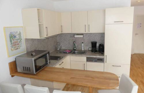 Einliegerwohnung mit Wintergarten (EG) - Foto 4