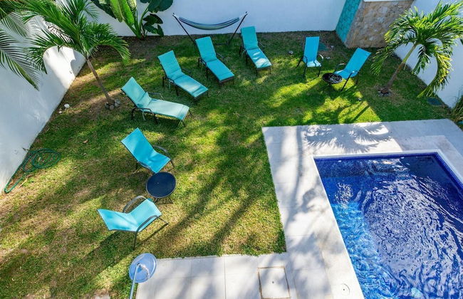 Ultramodern Townhome with an Inviting Coastal Design and Lush Outdoor Oasis with a Private Pool - Photo 25