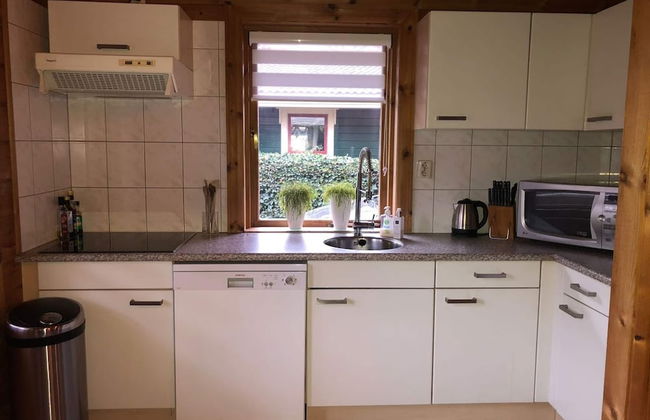 Bungalow met Omheinde Tuin op de Veluwe - Foto 9