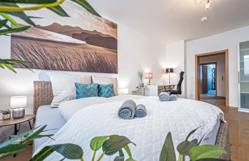 Gemütliche Ferienwohnung mit 2 Schlafzimmern, kostenfreiem Parkplatz, modernem Bad, Küche, Waschmaschine & Trockner - Foto 7