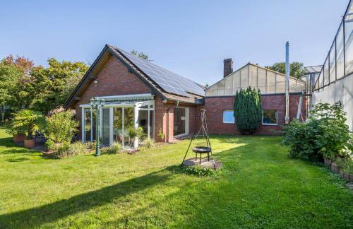 mit Wintergarten nah Moviepark - Foto 1