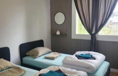 Le Temps d'un Séjour Clermont-Ferrand F3 2 chambres 1 chambre avec 1 lit simple et 1 chambre avec 2 lits doubles et 1 Garage - Foto 13