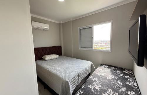 Apartamento Vista Mar Mirim 2 Dormitorios suite com Wifi para até 8 pessoas 1 vaga de estacionamento - Foto 12