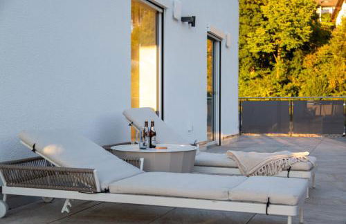 Exklusives Penthouse mit Whirlpool, Panoramaterrasse, Kino & Tischfußball für bis zu 8 Personen - Foto 15