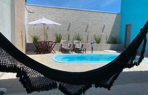 Casa com piscina e um quarto com ar split pé na areia a 50 metros da praia - Foto 4