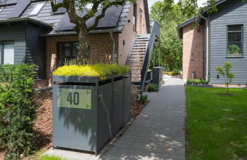 Traumhafte Ferienwohnung am Park, großer Balkon, voll ausgestattete Küche, Schreibtisch, WiFi, Smart TV, Carport, Wallbox, Fahrräder - Foto 54