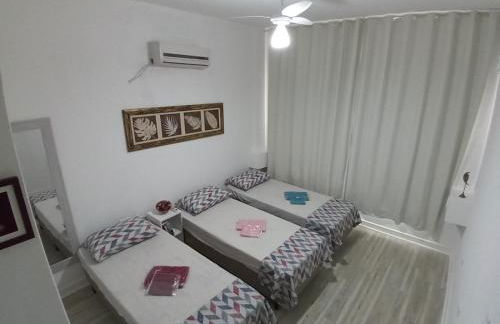 Ponta da Praia amplo 3dorm 3ban frente ao mar - Foto 27