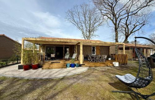 Chalet 18 tout confort pour un séjour dans domaine avec Piscine et en bordure Lac avec plage artificielle - Foto 1