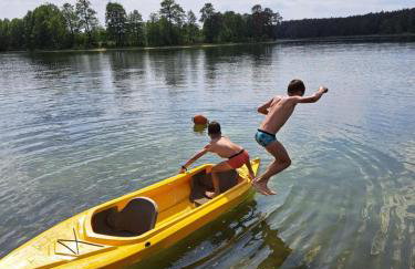 Domki przy jeziorze z prywatną plażą w Borach Tucholskich Pensjonat Alicja wczasy z dziećmi nowe luksusowe domki na skraju jeziora i lasu - Foto 13