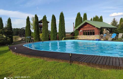 Dom nad stawem przy lesie - Foto 24