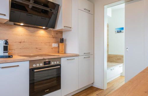 Hygge – Familienfreundliche Ferienwohnung mit Garten & Meerblick - Foto 20