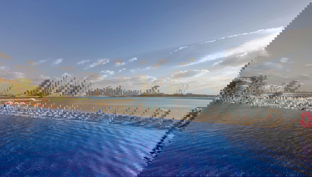 WelHome - Oceanfront Elegance 1BR Apt With Palm Sea Views - Foto 1, Imagen principal