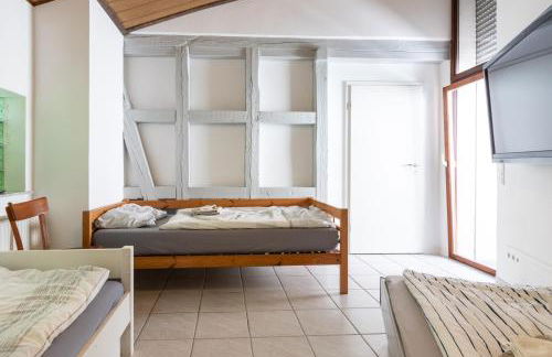 Arbeitnehmerunterkunft I 3 Betten I Balkon I eigene Küche & Bad - Foto 31