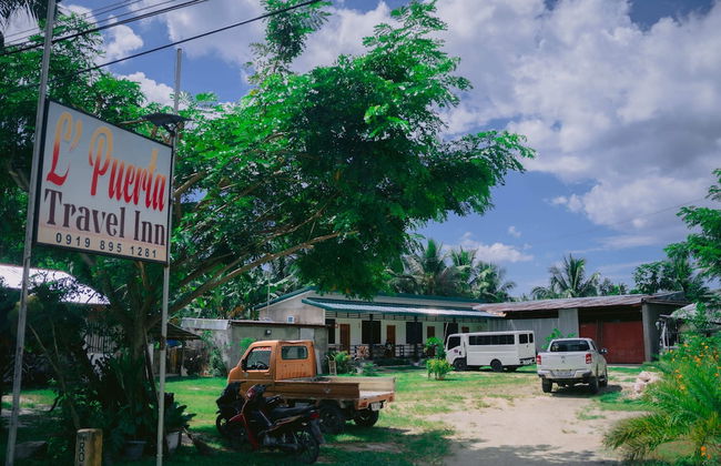 L'Puerta Travel Inn - Foto 1