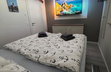 Haus Viking mit 2 Ferienwohnungen Bjorn 4 Pers und Floki 6 Pers mit Düne und Garten - Foto 13