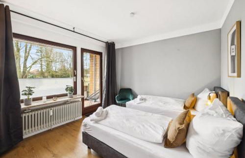 NASA Homes I Moderne Suite I Zentral I 3 Zimmer I Balkon und Aufzug I neu renoviert I Smart TV I Hotelbetten - Foto 2