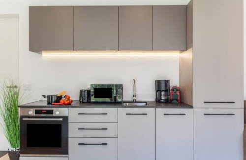 Adler Living Gartenwohnung - Foto 17