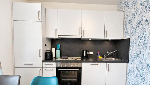 STANMA Heimat am Meer 100 m zum Meer mit Strandkorb - Foto 5, stove, dishwasher, toaster
