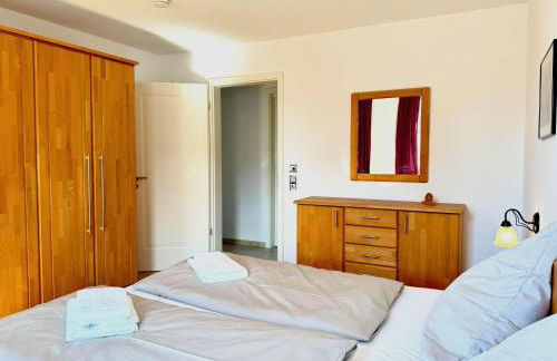 Ferienwohnung Residenz am See - exklusive Wohnung in erster Reihe mit Balkon und Seeblick - Photo 23