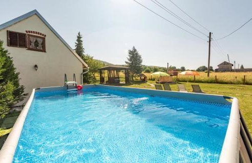 Nice Home In Udbina With House A Panoramic View - Photo 1