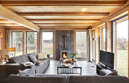 traumHaff Küstenchalets - einzigartige Chalets an der Ostsee. Ganz aus Lärchenholz mit Kamin und Sauna - Foto 6