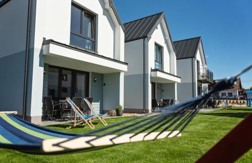 Siedlisko na wydmach, sauna,podgrzewane jacuzzi,domki klimatyzowane,starlink internet,parking - Photo 26