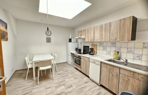 MR Living I moderne Apartments mit Einzelbetten, voll ausgestattete Küche, WLAN, Parkplatz, ideal für Monteure I DI01, DI02 - Foto 5