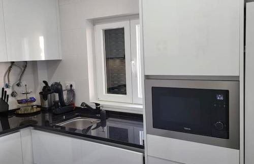 Nandos Apartement - Foto 14