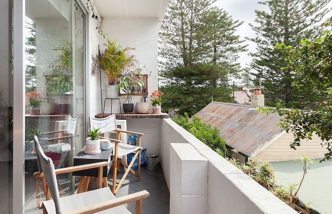 Surf Side Oasis with Balcony near Beach - Photo 10