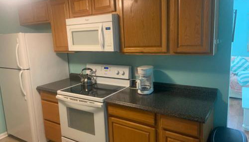 Cheerful two bedroom house 1.5 miles from beach. - Foto 3, stove