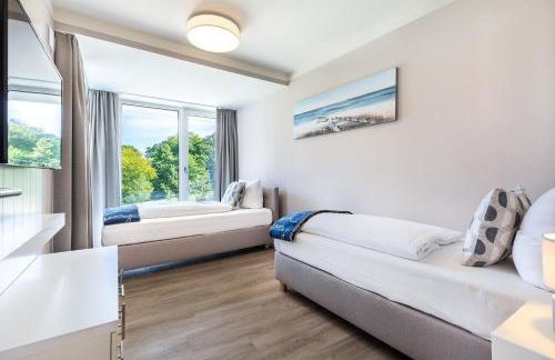 Godewindpark Deluxe-Suite 1-02 mit Ost-Loggia und schönem Gartenblick - Foto 32