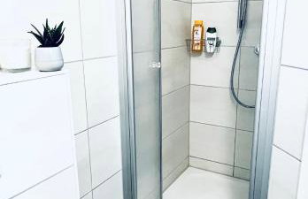 Modern eingerichtetes Apartment mit Balkon - Foto 16