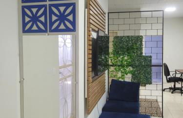 Casa funcional - 02 quartos, 02 camas de casal, 01 cama de solteiro, cozinha gourmet e garagem para carro pequeno - Foto 12