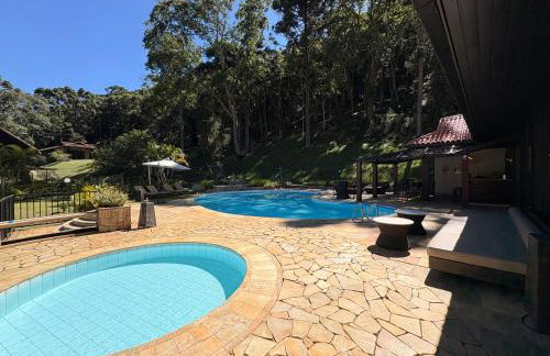 Casa 05 Vale Boa Vista - Refúgio Moderno em Condomínio Exclusivo - Photo 12