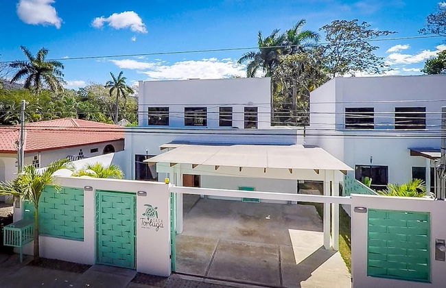 Ultramodern Townhome with an Inviting Coastal Design and Lush Outdoor Oasis with a Private Pool - Photo 34