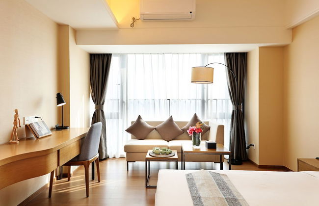 Yuwa Serviced ApartHotel - Photo 26