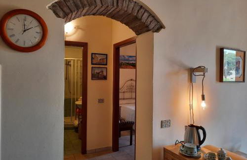 INCANTEVOLE CASA TOSCANA con travi in legno, ampia terrazza e vista sulle colline - Foto 32