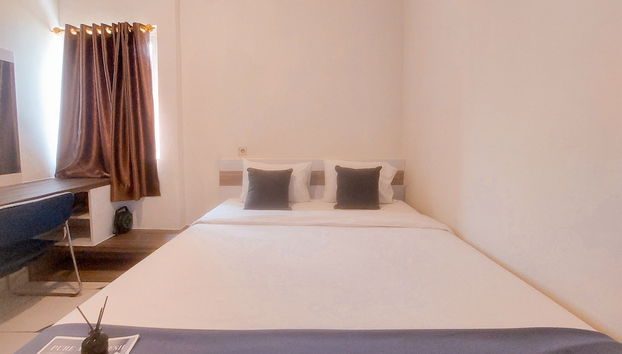 Minimalist and Homey Studio (No Kitchen) Apartment Aeropolis Residence - Foto 2, Habitación