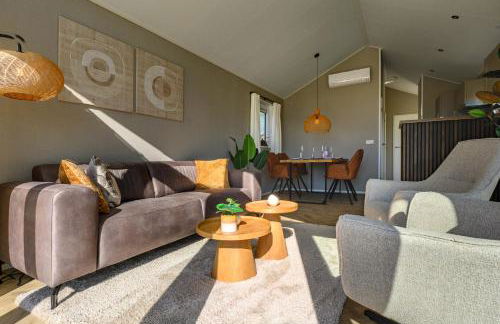 Chalet Charleston 066 mit eigener Terrasse am Wasser - Foto 9