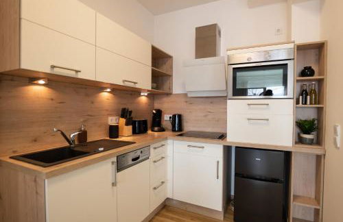 DWELLSTAY - Modernes Apartment I 55qm I 2 Zimmer I Küche I Bad I Terrasse I TV I WLAN - Foto 17